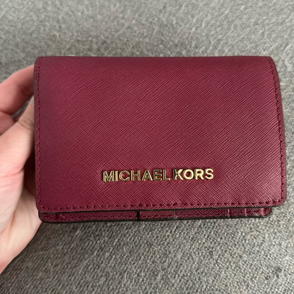 Red Micheal Kors wallet